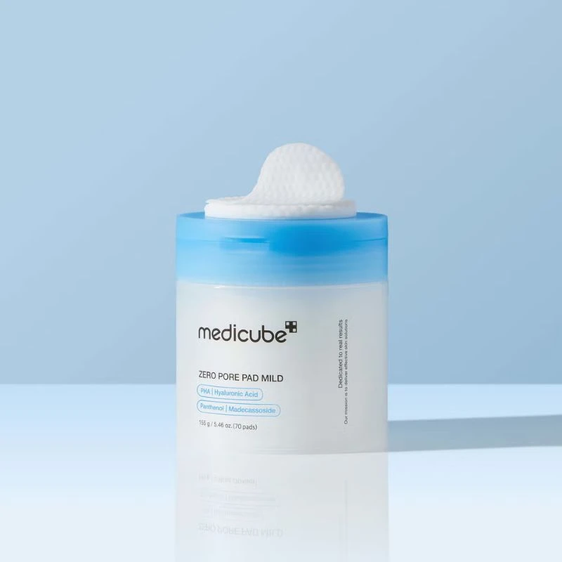 Medicube Zero Pore Pad 2.0 jar with toner pads for pore care on a light blue background