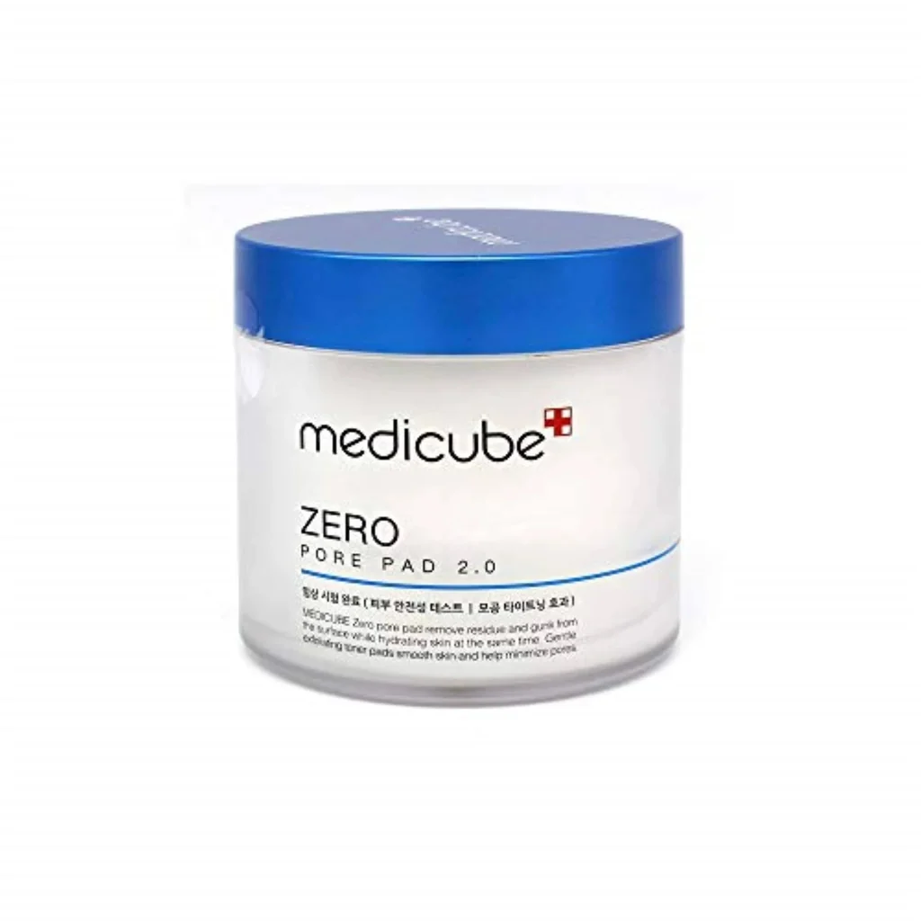 Medicube Zero Pore Pad jar with a vibrant blue cap and saturated exfoliating toner pads stacked on top.