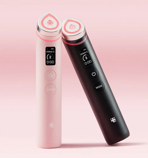 Medicubeagerboosterbothcolours Medicube Age-R Booster Pro skincare devices shown in both pink and black color variants against a pink background.